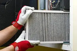 Don't Let Indoor Air Quality Suffer This Winter 1 replace filter to improve air quality