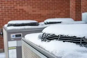 Air Conditioner covered with Snow